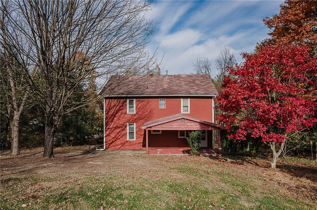 211 Old Mill Road Apollo, PA 15613 - Photo 39 of 42 a front view of a house with yard and trees