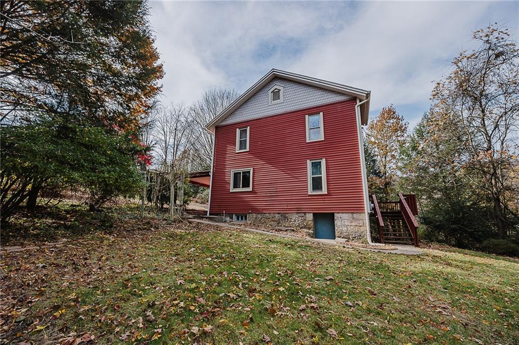 211 Old Mill Road Apollo, PA 15613 - Photo 42 of 42 a front view of a house with a yard