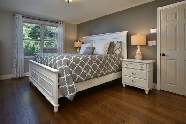 9 Flintlock Ridge Road Cohasset, MA 02025 - Photo 7 of 14 a bed room with a bed and window