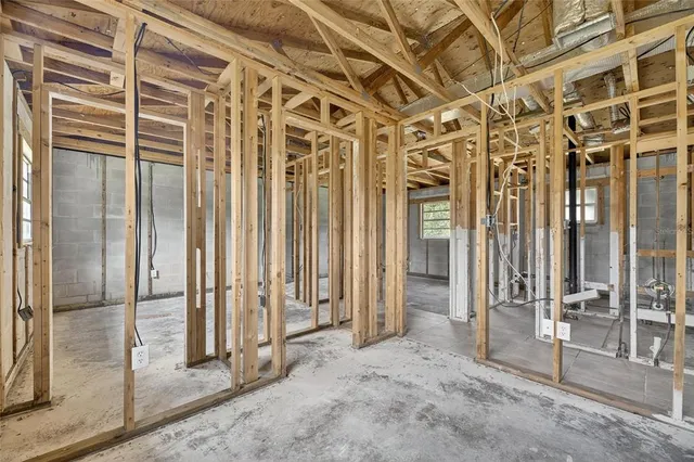 a view of a room with wooden walls