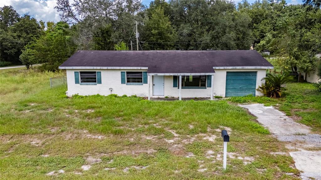 33099 Mulberry Road Dade City, FL 33523 - Photo 8 of 21 a house view with a backyard space