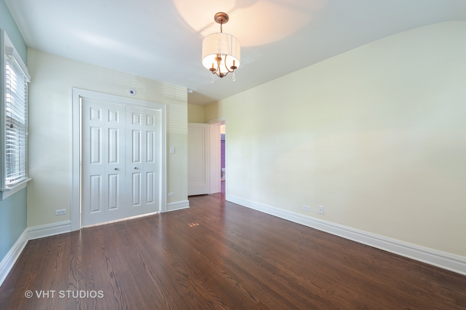 510 Berkeley Road Riverside, IL 60546 - Photo 14 of 30 a view of an empty room with wooden floor