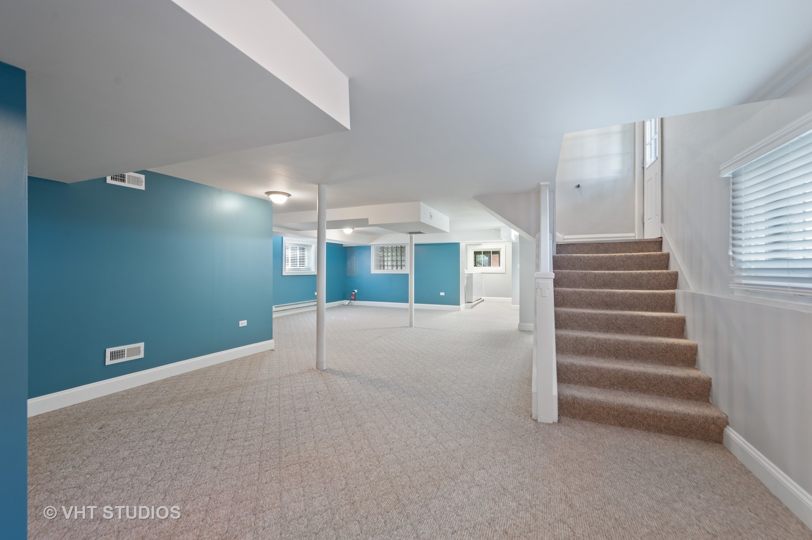 510 Berkeley Road Riverside, IL 60546 - Photo 23 of 30 a view of an empty room with stairs and a window