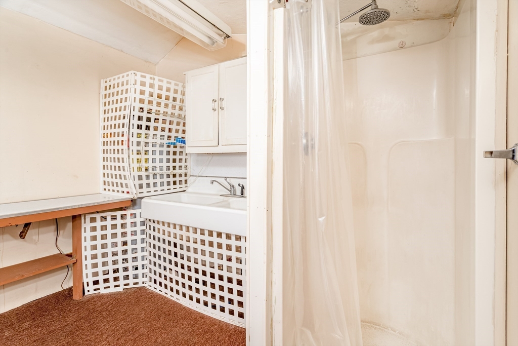 382 West Main Street Groton, MA 01450 - Photo 13 of 38 a bathroom with a window