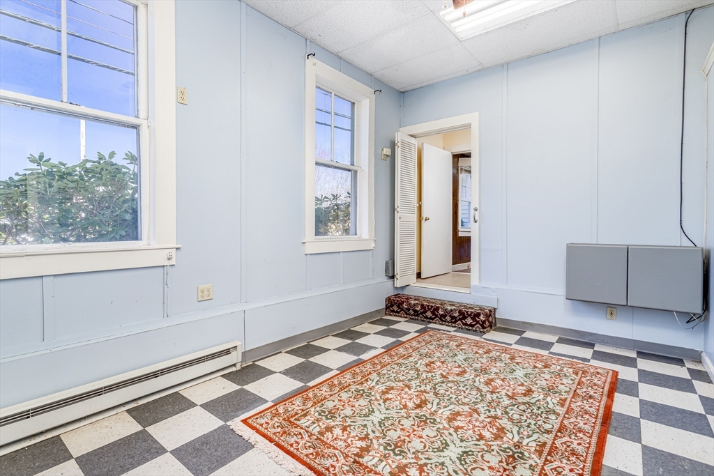 382 West Main Street Groton, MA 01450 - Photo 17 of 38 a view of a bedroom with furniture and windows