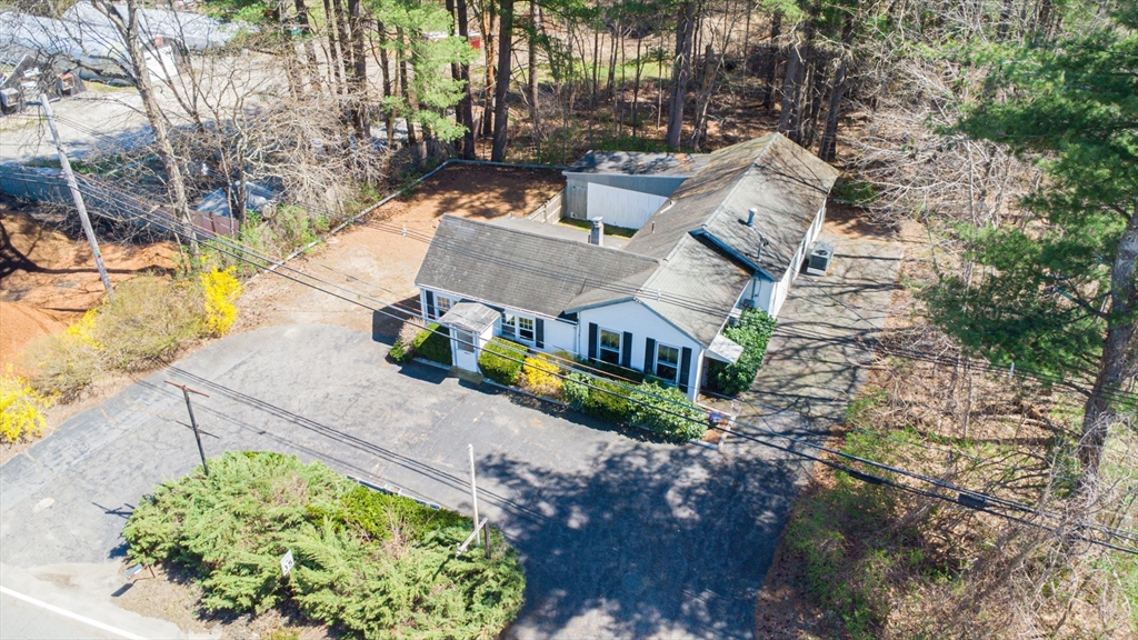 382 West Main Street Groton, MA 01450 - Photo 2 of 38 an aerial view of a house with a yard basket ball court and outdoor seating