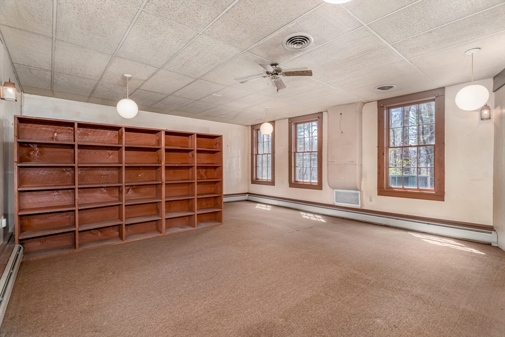 382 West Main Street Groton, MA 01450 - Photo 24 of 38 a view of an empty room with a window