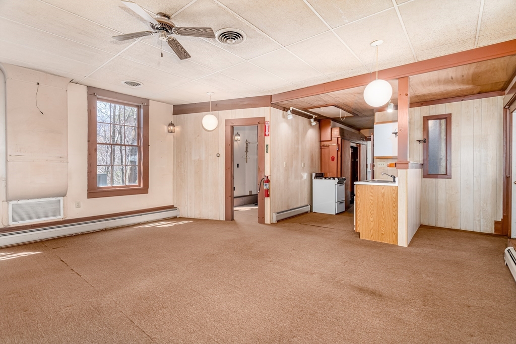 382 West Main Street Groton, MA 01450 - Photo 25 of 38 an empty room with closet and windows