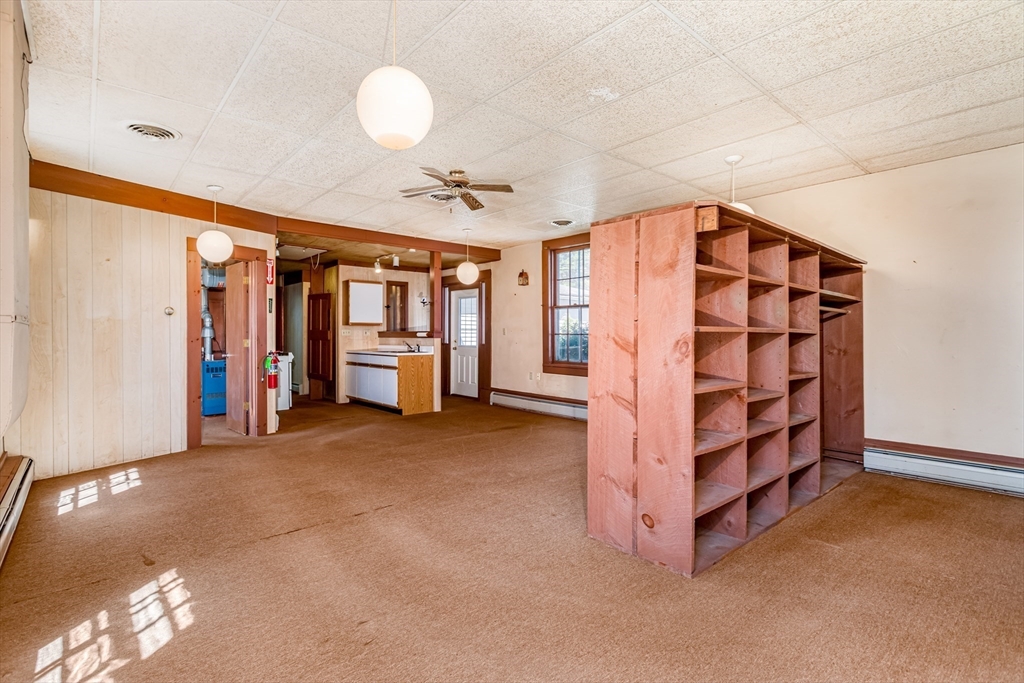 382 West Main Street Groton, MA 01450 - Photo 27 of 38 a view of an empty room with a cabinet