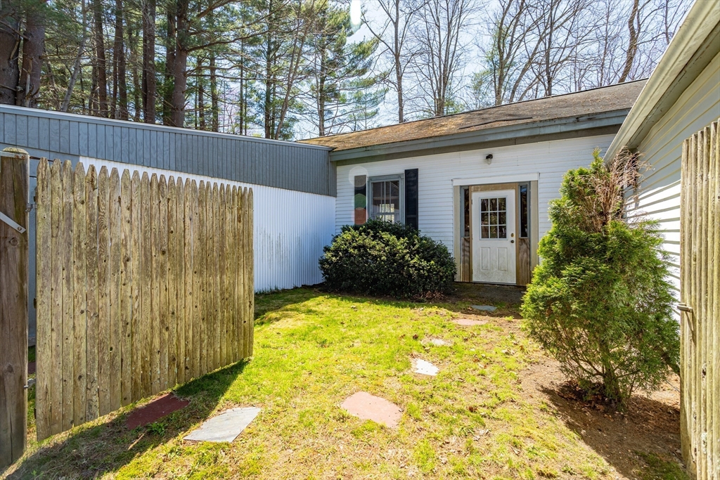382 West Main Street Groton, MA 01450 - Photo 4 of 38 a house view with a outdoor space