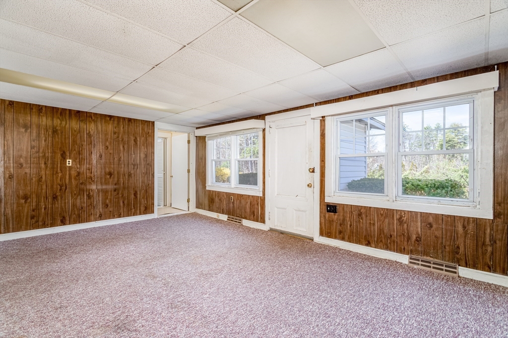 382 West Main Street Groton, MA 01450 - Photo 7 of 38 an empty room with windows