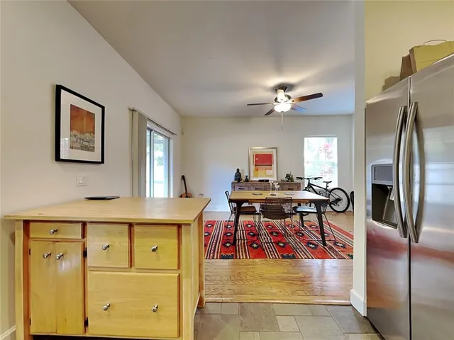 a stove top oven sitting inside of a kitchen