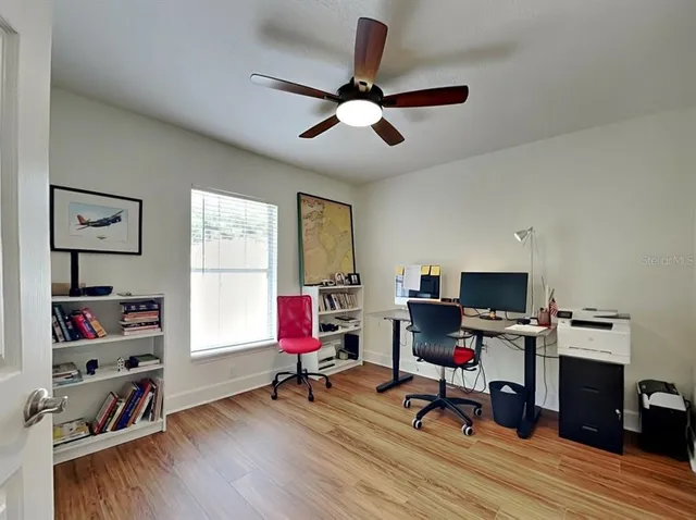 a front view of house with small garden