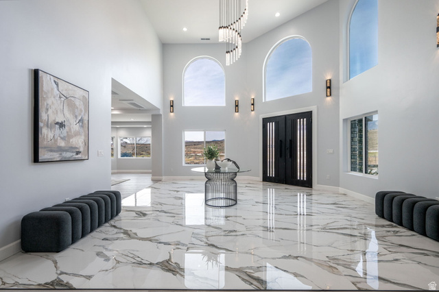 476 Spring Drive Toquerville, UT 84774 - Photo 9 of 95 Foyer entrance with light marble finish floors, healthy amount of natural light, recessed lighting, and a high ceiling