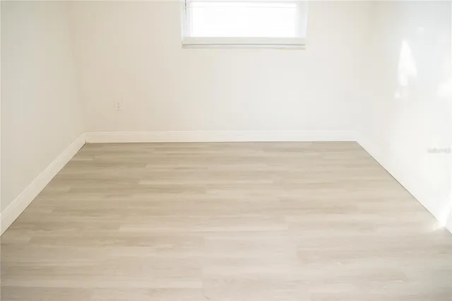a kitchen with a stove microwave and refrigerator