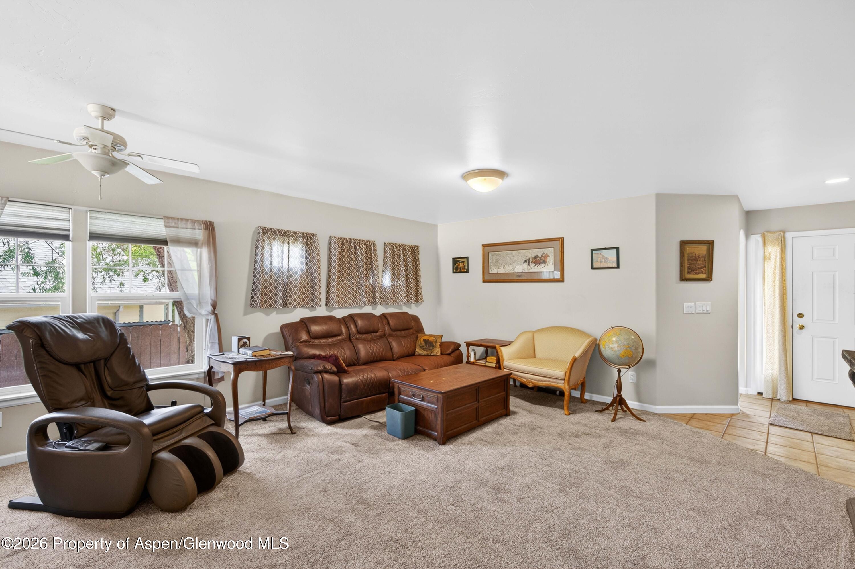 608 Lariat Loop New Castle, CO 81647 - Photo 3 of 32 a living room with furniture and a window