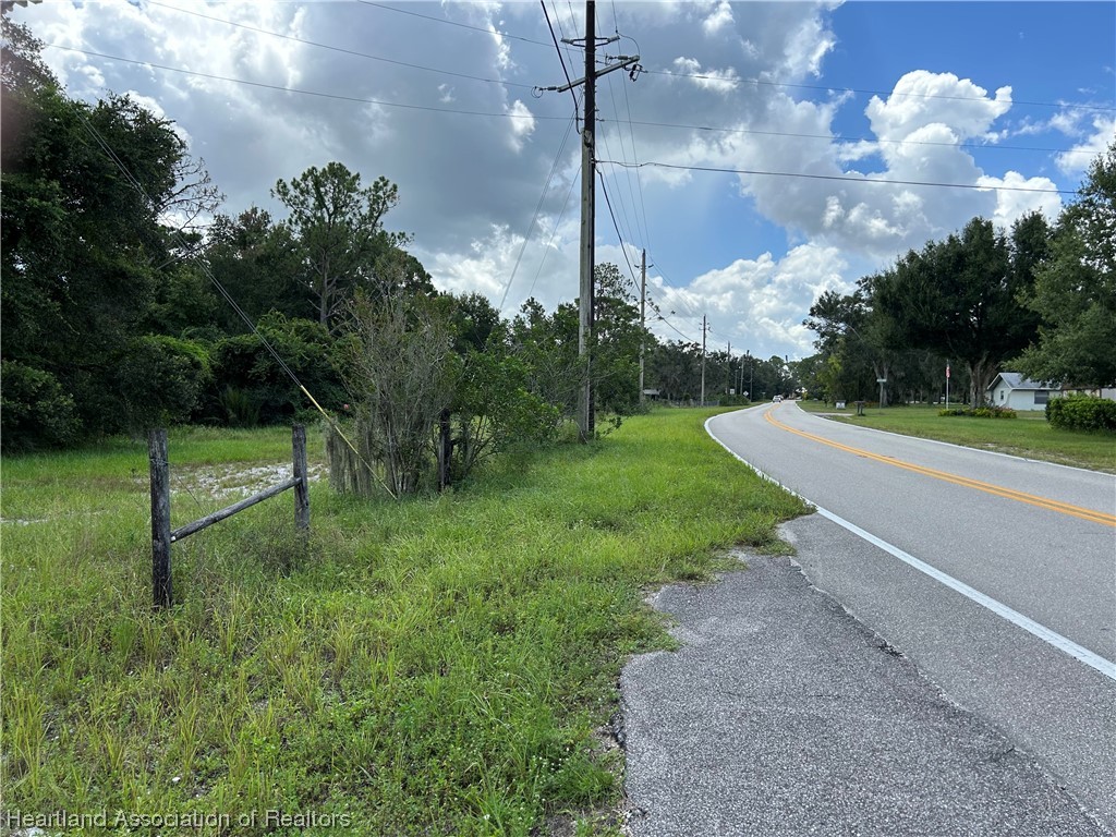 6835 Sparta Road Sebring, FL 33875 - Photo 15 of 22 a view of a yard with entertaining space