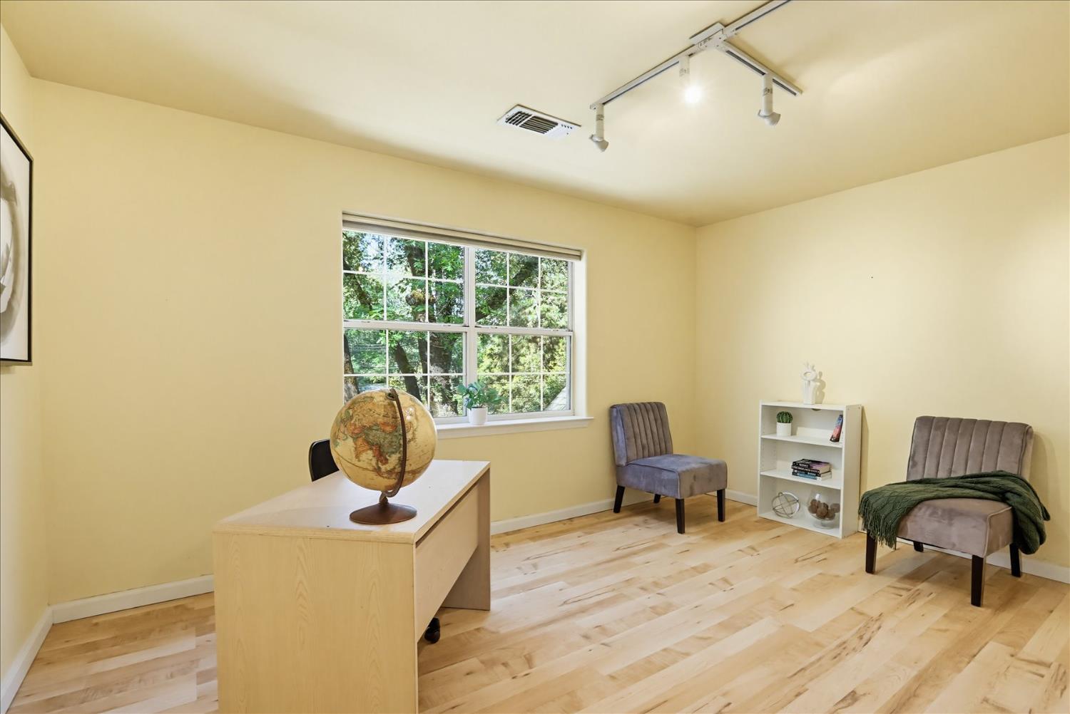21324 Oak Ridge Drive Grass Valley, CA 95945 - Photo 22 of 32 a living room with furniture and a window
