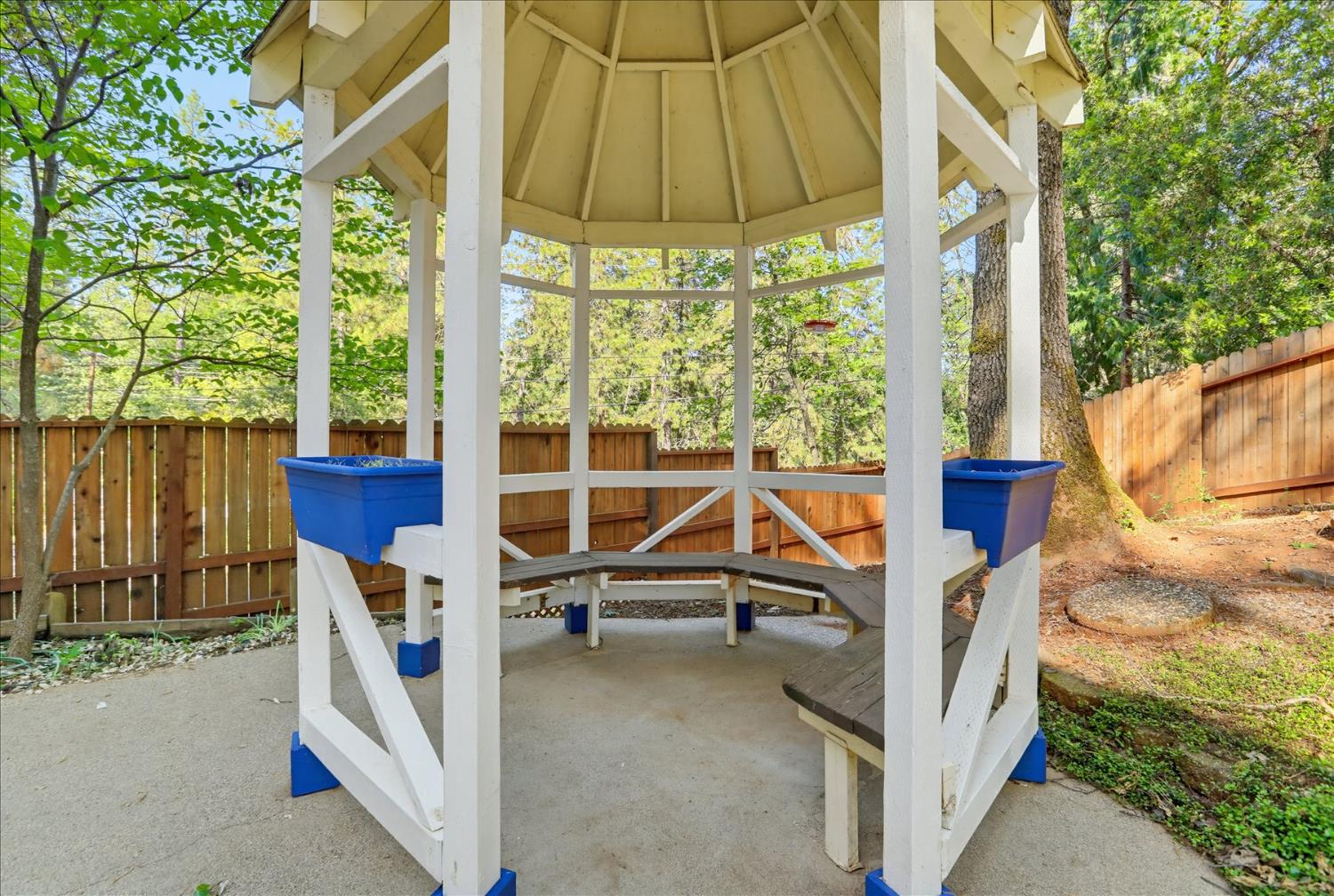 21324 Oak Ridge Drive Grass Valley, CA 95945 - Photo 24 of 32 a house view with a garden space