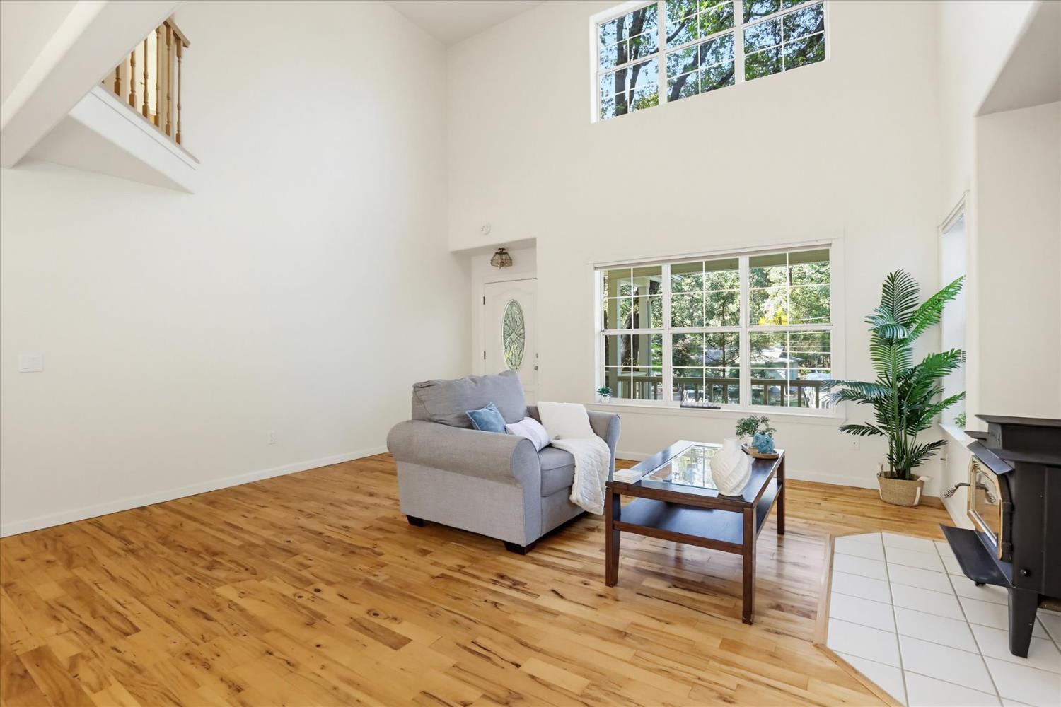 21324 Oak Ridge Drive Grass Valley, CA 95945 - Photo 4 of 32 a living room with furniture and a large window