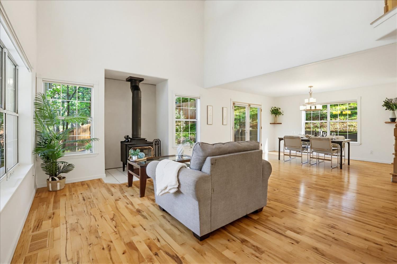21324 Oak Ridge Drive Grass Valley, CA 95945 - Photo 5 of 32 a living room with furniture and a large window