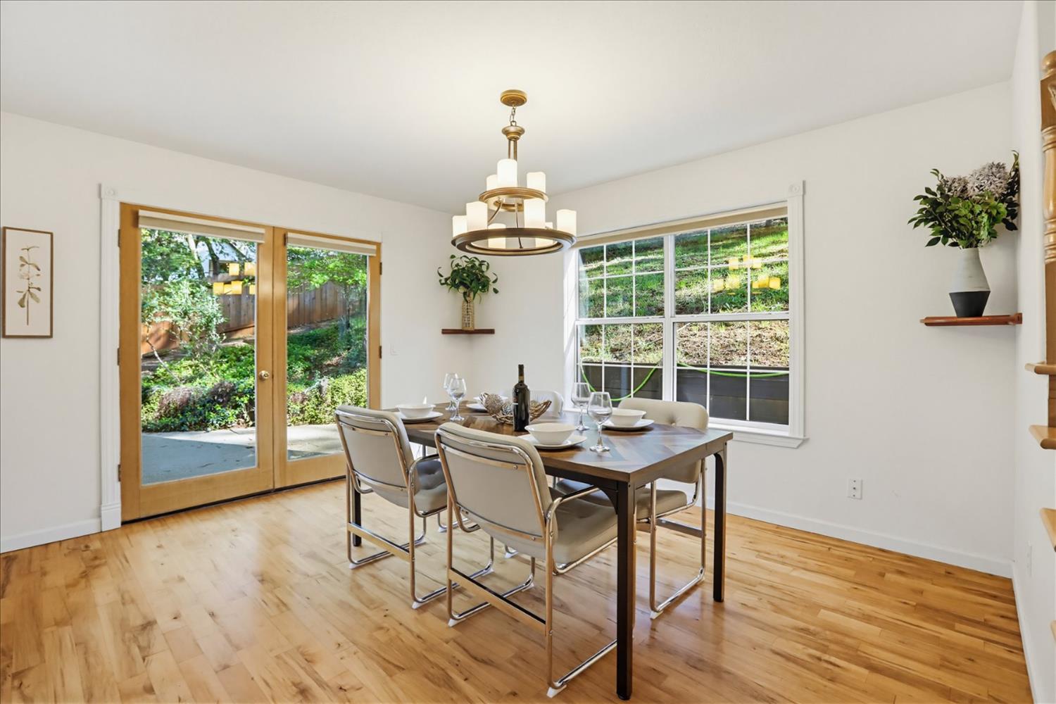 21324 Oak Ridge Drive Grass Valley, CA 95945 - Photo 6 of 32 a view of a dining room with furniture window and outside view