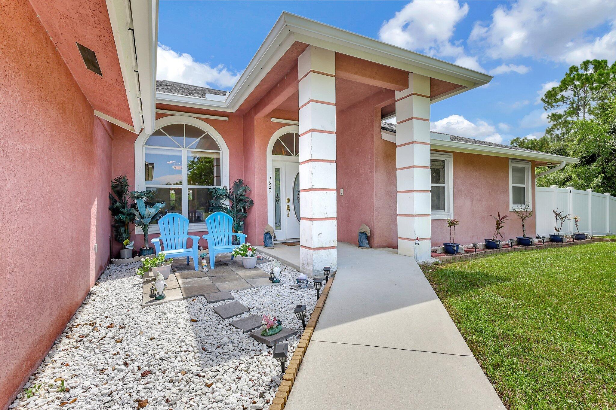 1624 Southwest Gregor Way Stuart, FL 34997 - Photo 8 of 69 Exterior Front