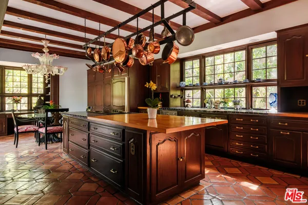 a very nice looking kitchen with a large window