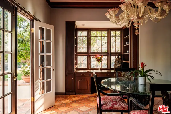 a view of livingroom with furniture a fireplace and wooden floor
