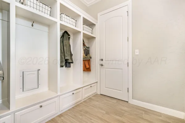 a utility room with sink dryer and washer