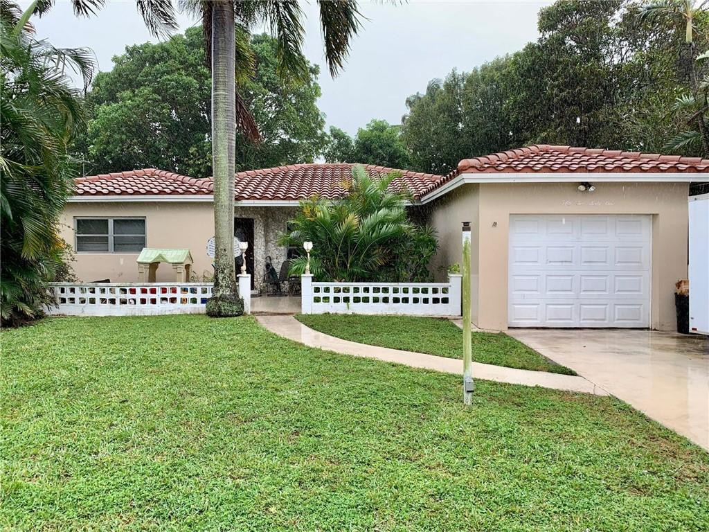 5261 Southwest 7th Street Margate, FL 33068 - Photo 1 of 17 a view of a house with a yard