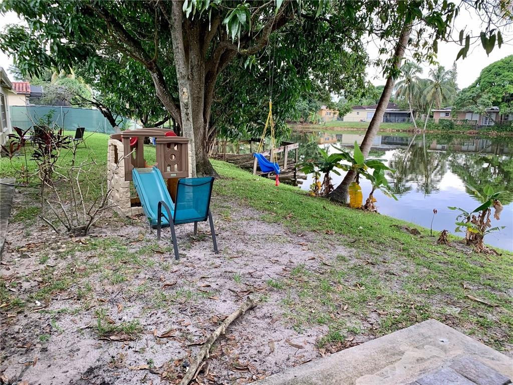 5261 Southwest 7th Street Margate, FL 33068 - Photo 15 of 17 a view of a park with large trees