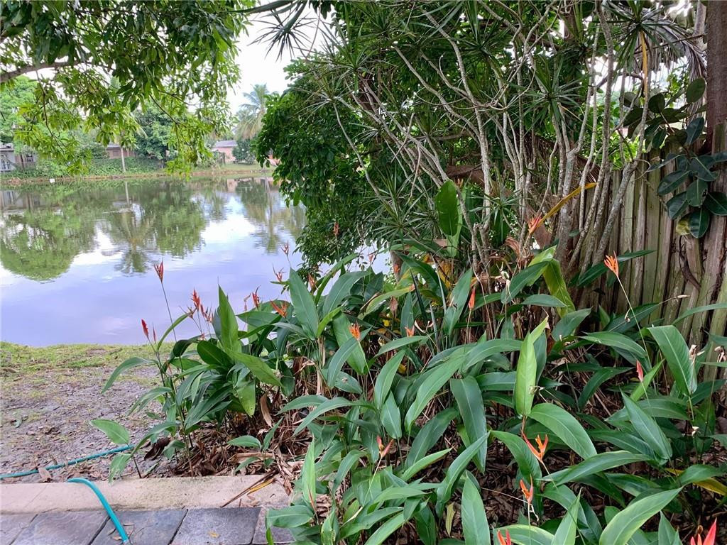 5261 Southwest 7th Street Margate, FL 33068 - Photo 16 of 17 a view of a lake with a garden