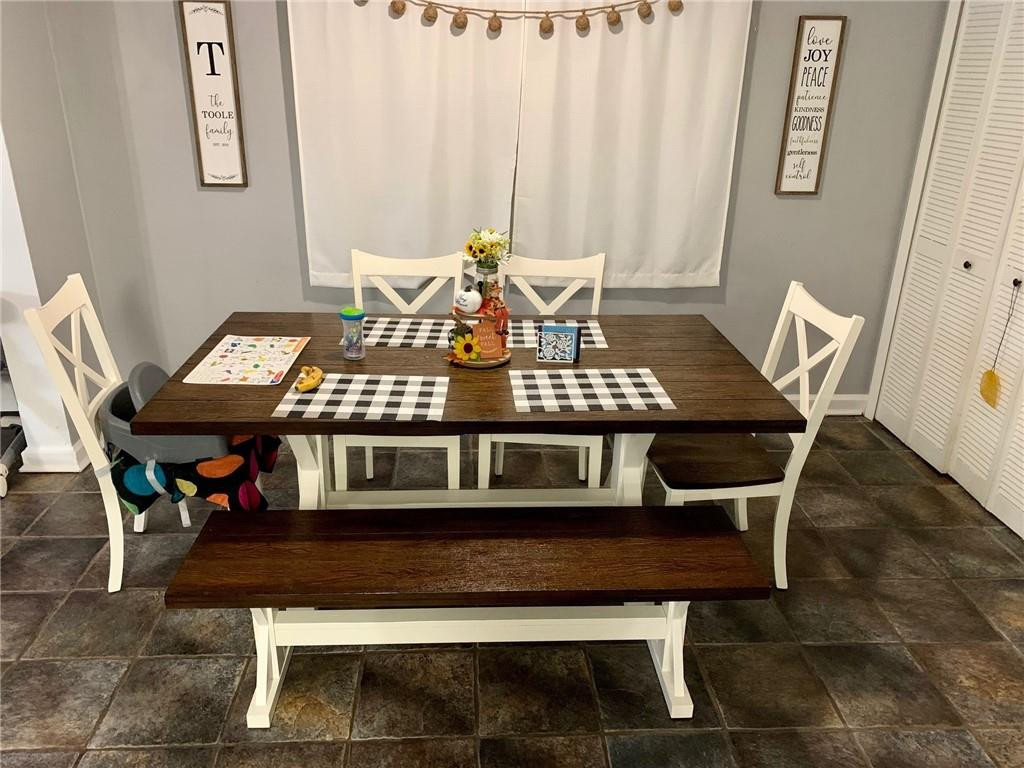 5261 Southwest 7th Street Margate, FL 33068 - Photo 4 of 17 a view of a dining room with furniture and wooden floor