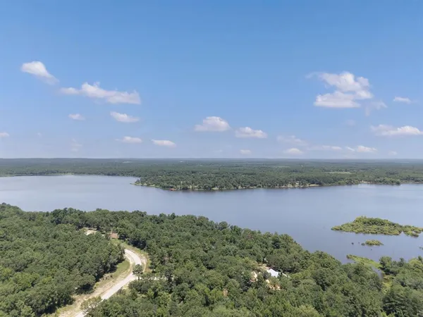 a view of a lake from a yard