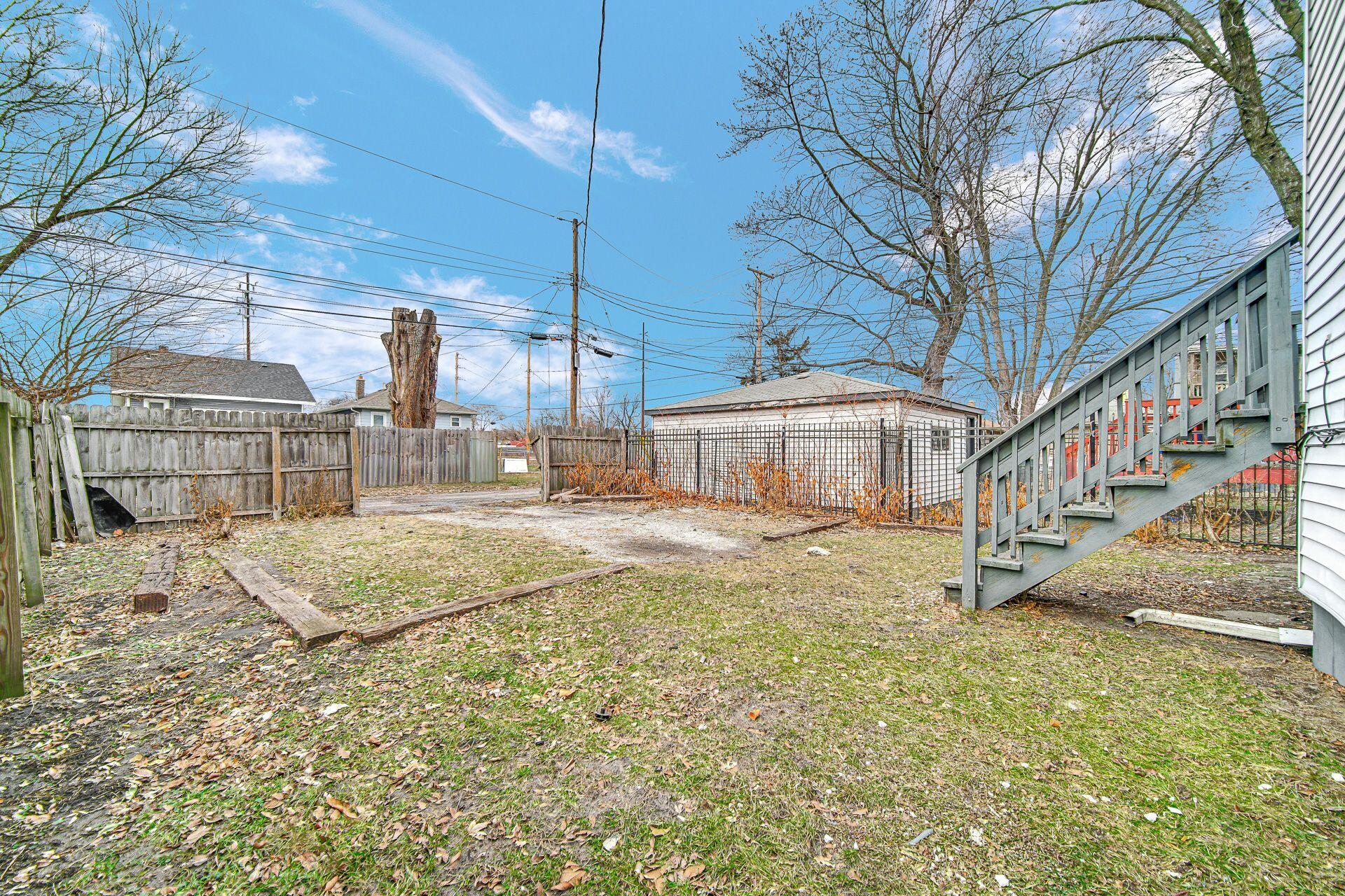 6220 Garfield Avenue Hammond, IN 46324 - Photo 2 of 20 a view of a house with a yard