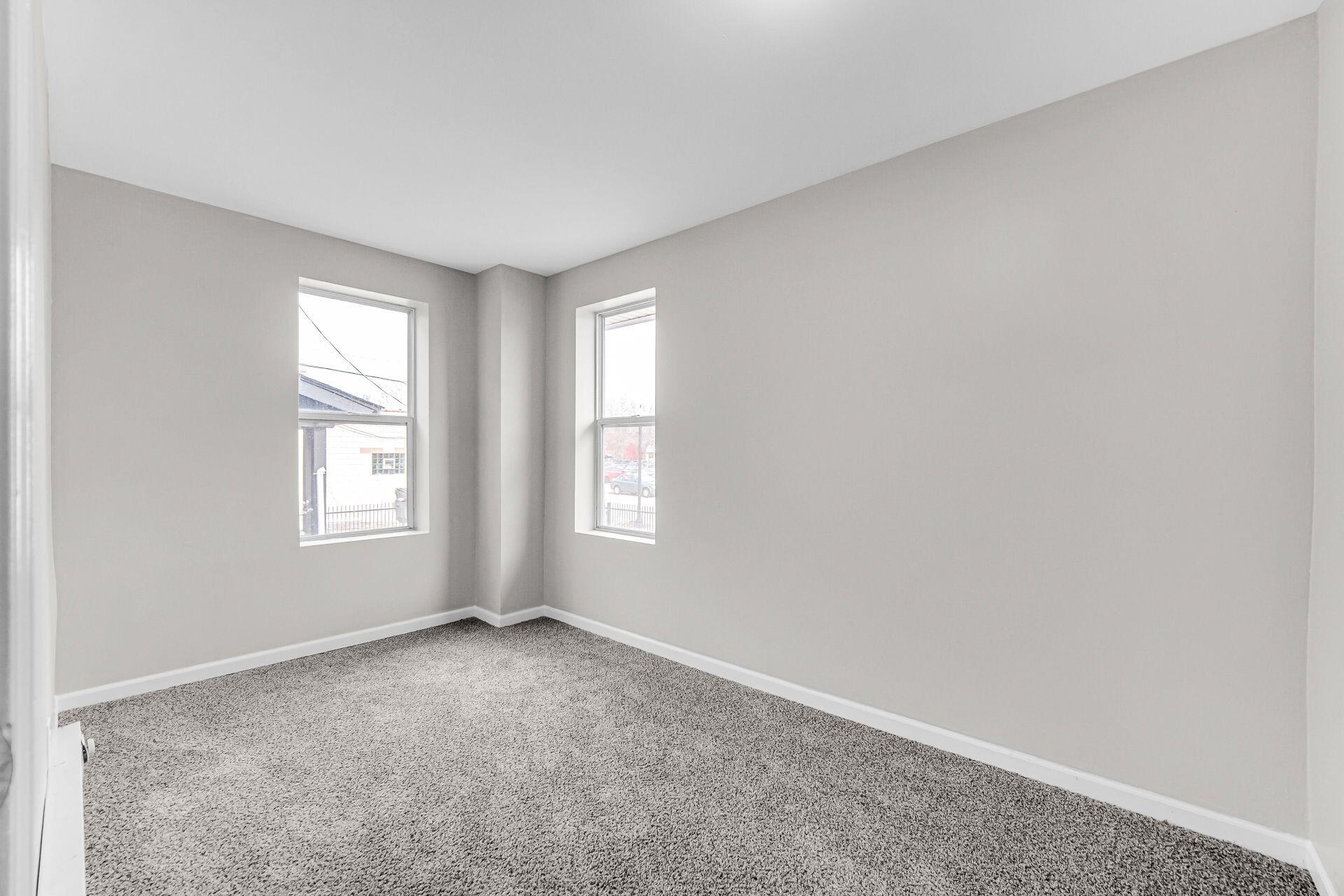 6220 Garfield Avenue Hammond, IN 46324 - Photo 6 of 20 an empty room with windows