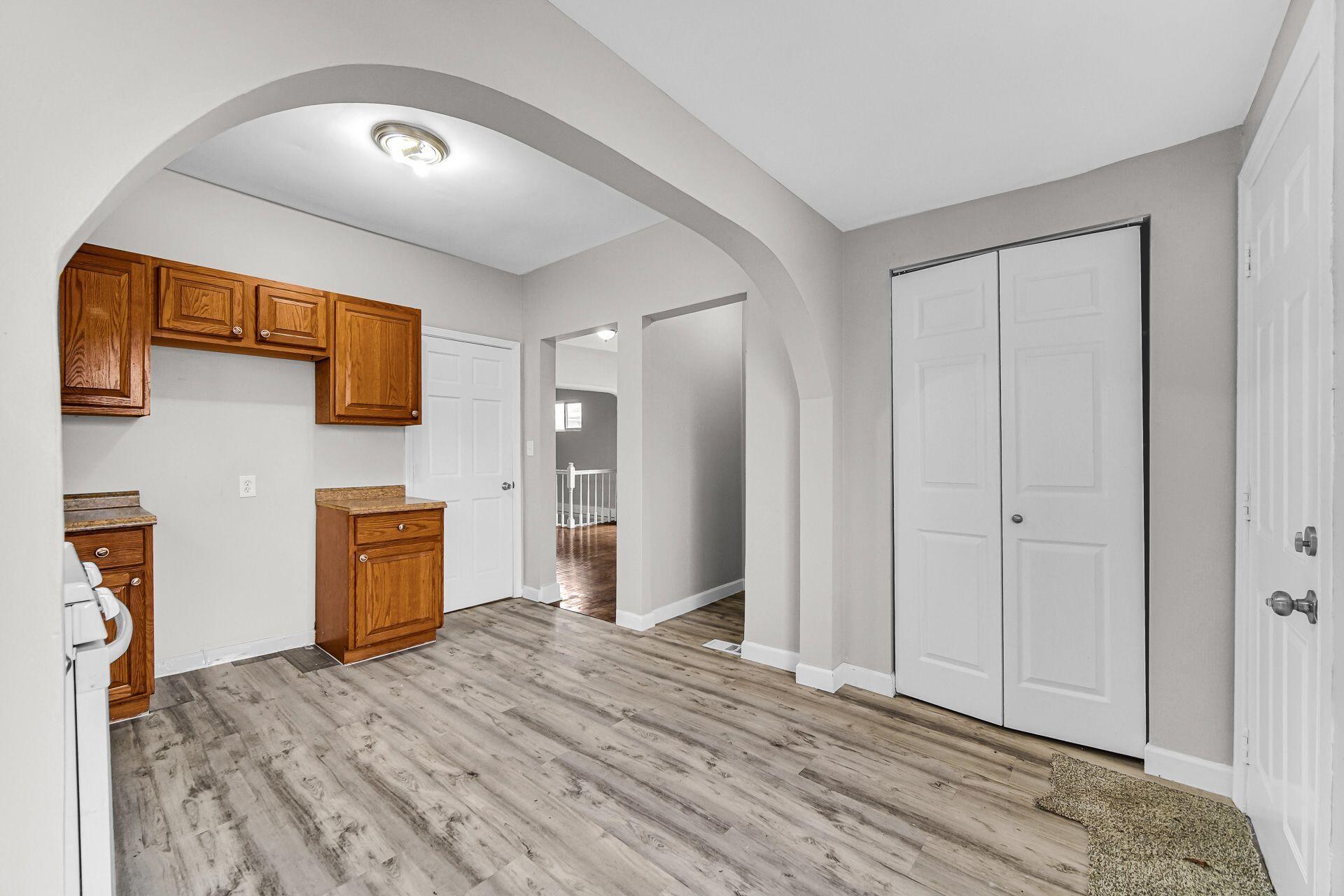 6220 Garfield Avenue Hammond, IN 46324 - Photo 9 of 20 a view of a livingroom with wooden floor and closet