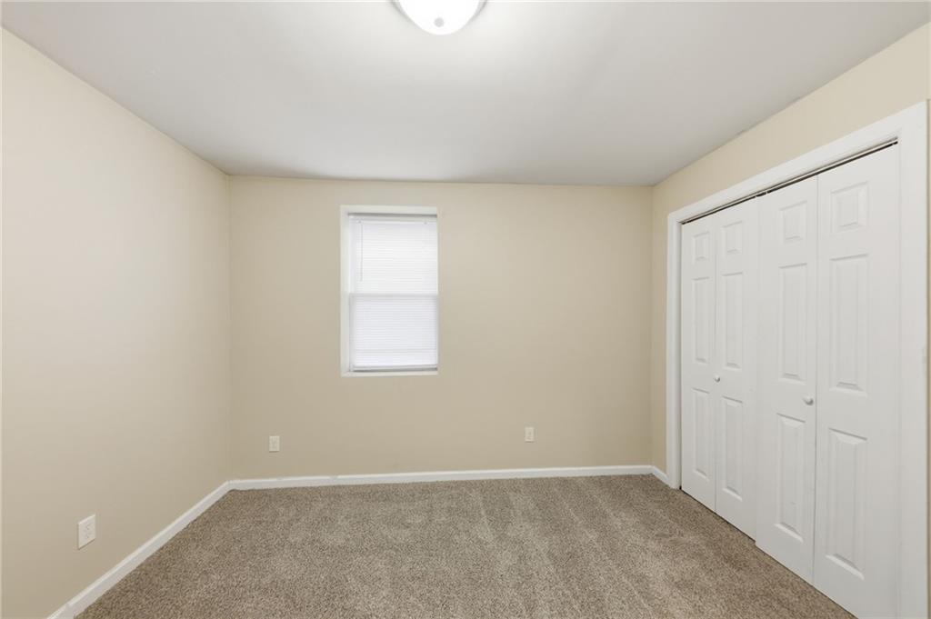 94 Ericson Street Southeast Atlanta, GA 30317 - Photo 16 of 39 an empty room with windows