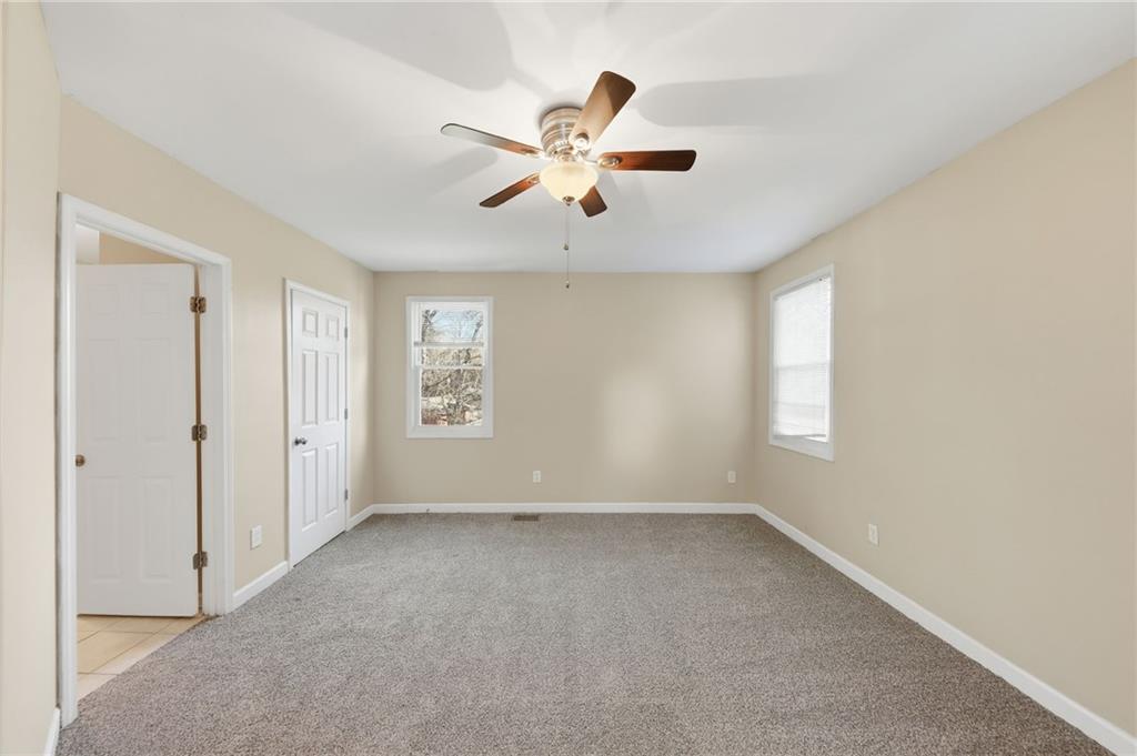 94 Ericson Street Southeast Atlanta, GA 30317 - Photo 18 of 39 a view of an empty room with a window