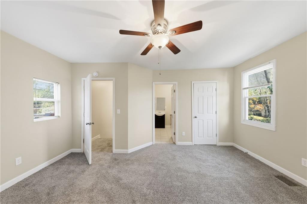 94 Ericson Street Southeast Atlanta, GA 30317 - Photo 19 of 39 a view of an empty room with a window