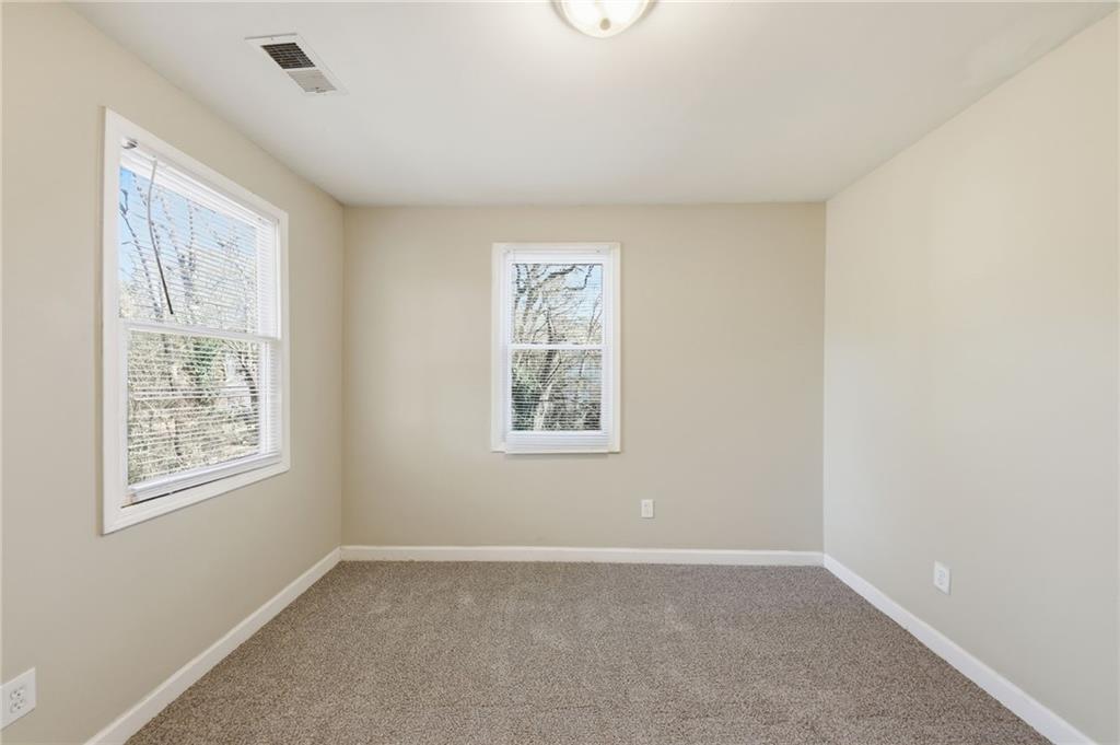 94 Ericson Street Southeast Atlanta, GA 30317 - Photo 20 of 39 a view of an empty room with a window