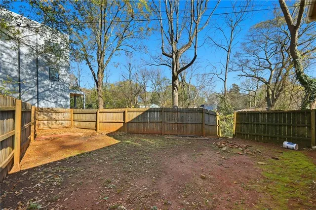 a view of backyard with trees