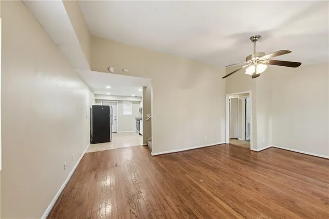 a view of a livingroom with wooden floor