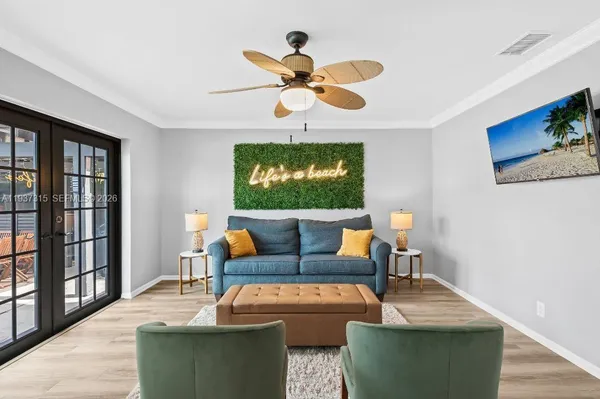 a living room with furniture and a window