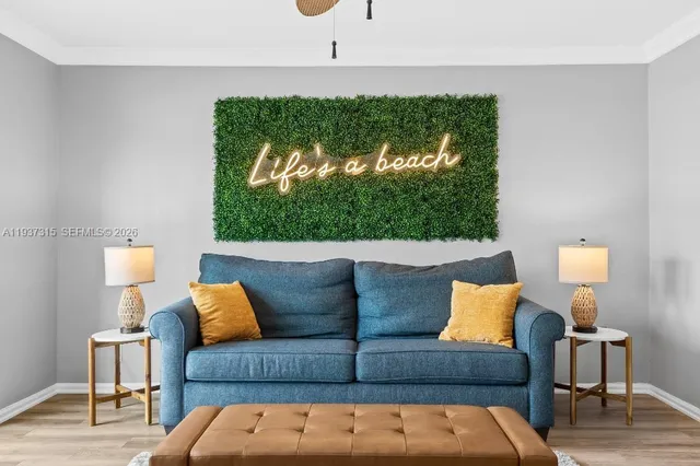 a living room with furniture and a window