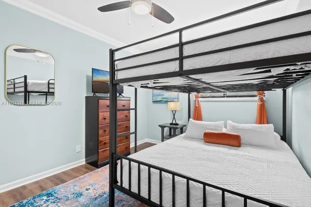 a bedroom with a bed and a walk in closet