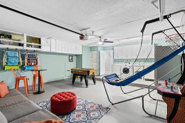 a bedroom with furniture and a chair