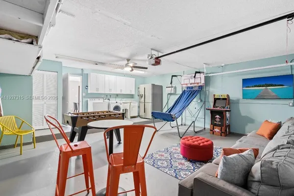 a workspace with furniture and wooden floor