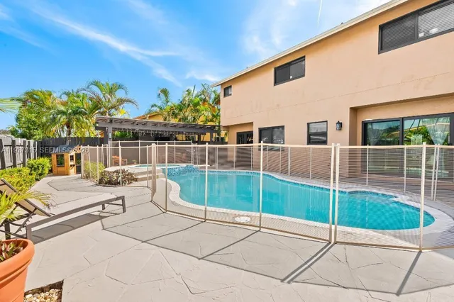 a view of a backyard with a patio
